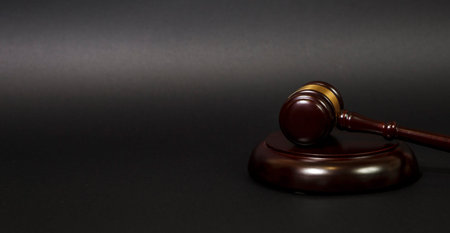 Judge's gavel on black table in courtroom. Justice, Law, Attorney and Court judge concept.の写真素材