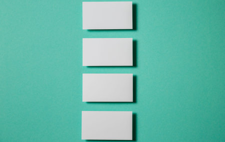Business cards blank. Mockup on color background. Flat Lay. copy space for textの写真素材