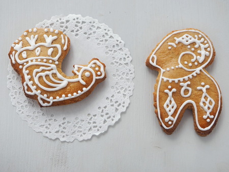 Culinary background. Homemade Christmas sugar cookies glazed with royal icing. Christmas biscuits in the shape of animals. Selective focus.の写真素材