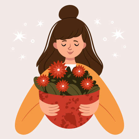 Stylish girl in a yellow cardigan with a large cup of autumn flowers.のイラスト素材