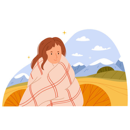 The girl is wrapped in a warm blanket against the background of an autumn mountain landscape. cute autumn illustrationのイラスト素材