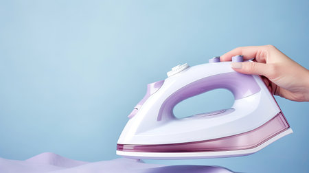 female hand with iron on colour background, ai generatedの素材