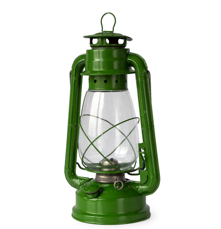 Green vintage kerosene lantern, isolated on white backgroundの写真素材