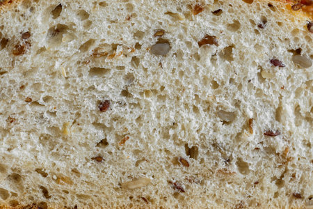 Bread with different seeds in the cut close-up