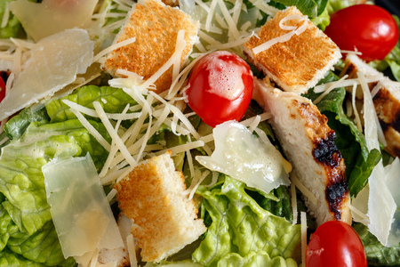 Caesar salad with chicken and tomatoes, Roman saladの写真素材