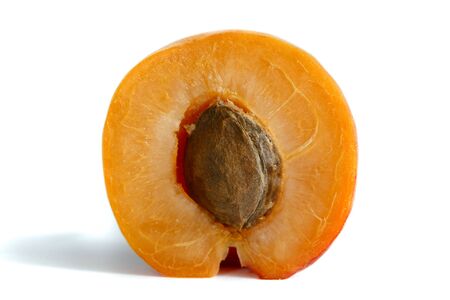 Ripe yellow-red apricots, half in close-up cutの写真素材