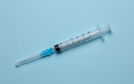 Disposable Plastic SyringeClose-up disposable medical syringe made of plastic