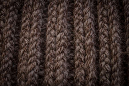 Background image with a close-up of the hairs on the pigtail loops of brown yarn.の写真素材