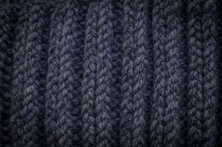 Close-up of the texture of a handmade knitted sweater. Rows of loops. High quality photoの写真素材