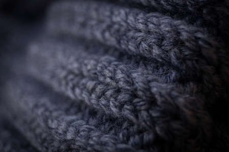 Close-up of the texture of a handmade knitted sweater. Rows of loops.の写真素材