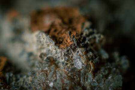 A sample of rock with amethyst under great magnification. Mountain mineral with crystals. Macro, horizontal compositionの写真素材
