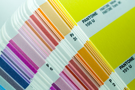 Pantone system. Color samples. Color palette. Cardboard cards with a sample and color code. Selective focusのeditorial素材