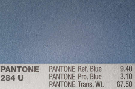 PANTONE 284 U. Cardboard card with a sample color of the Pantone system. Selection of color by palette of colors. Selective focusのeditorial素材