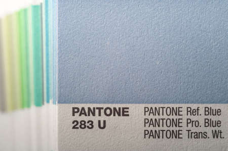 PANTONE 283 U. Cardboard card with a sample color of the Pantone system. Selection of color by palette of colors. Selective focusのeditorial素材