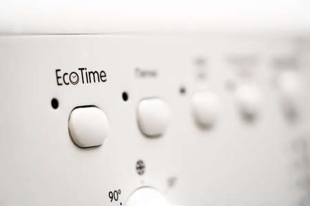 Washing machine control panel. Regime EcoTime. Buttons for switching modes of operation. Selective focusの写真素材