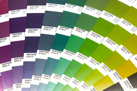 Berdsk, Russia - November 26, 2021: Pantone color palette. A sample of the chromaticity of the Pantone guide. Catalog of color samples. Selective focusのeditorial素材