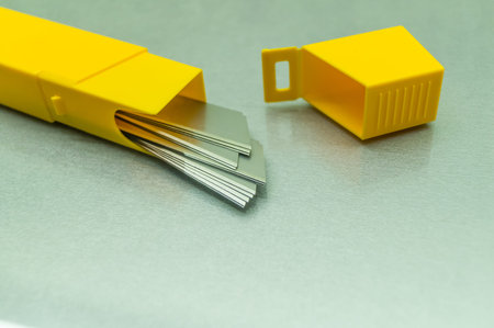 New blades for stationery knife. A pack of spare stationery blades. Selective focus, copy space