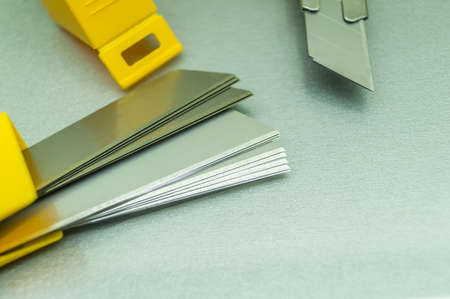 New blades for stationery knife. A pack of spare stationery blades. Selective focus, copy spaceの写真素材