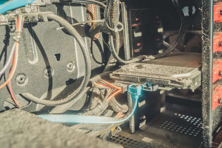 A very dusty computer. A layer of dust and dirt on the parts of the system unit of a desktop computer. Selective focusの写真素材
