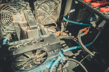 Berdsk, Russia - 11.12.21: A very dusty computer. A layer of dust and dirt on the parts of the system unit of a desktop computer. Video card Sapphire HD7770, processor cooler Zalman. Selective focusのeditorial素材