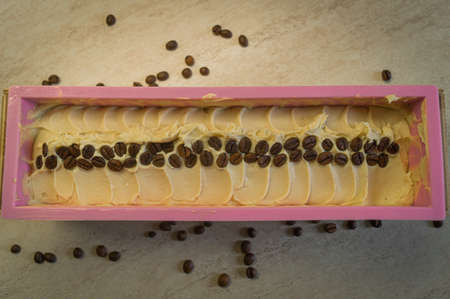 Base for handmade coffee soap in a mold.の写真素材