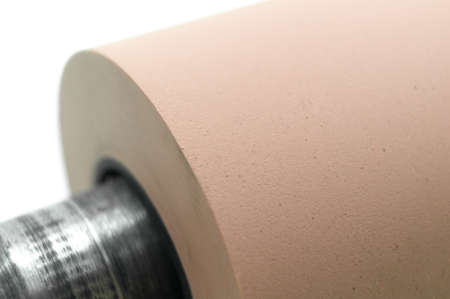 Anilox roller for flexographic printing machine. Raster cylinder for transferring ink to the printing roller. Selective focus, isolated on whiteの写真素材
