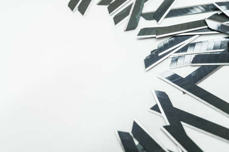 New black blades for stationery knife. A pack of spare stationery blades. Selective focus, copy spaceの写真素材