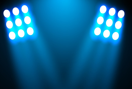 Spotlight on a black background. The blue light shines from the bulbs. The vector illustrationのイラスト素材