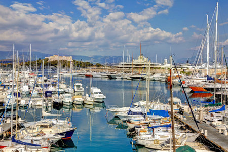 View from the street in Antibes, France. Port with boats and yachts.の写真素材