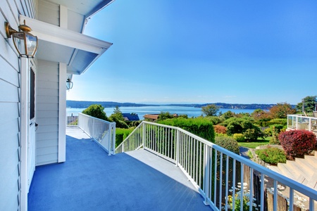 House exterior grey large porch with water view.の写真素材