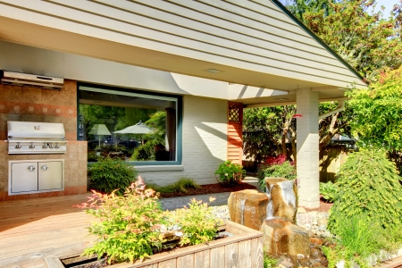 House outdoor BBQ grill area on the backyard.の写真素材