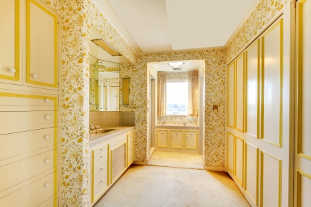 Old American house bedroom interior with wallpaper and carpet.の写真素材