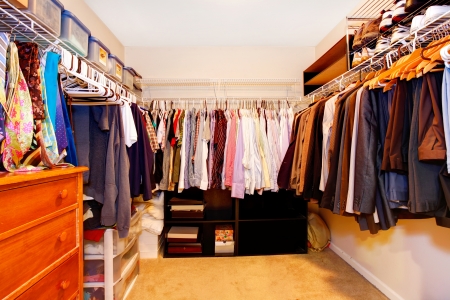 Bachelor closet interior with lots of busines clothes.の写真素材