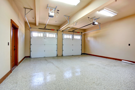 Empty garage with roller door  View of horizontal tracks の写真素材
