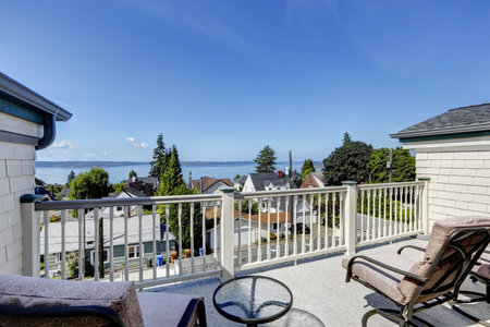 Cozy walkout deck with sitting area. Deck overlook scenic bay view