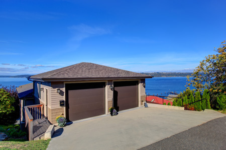 House exterior. Two car garage with driveway. Puget Sound view, Tacoma, WAの写真素材