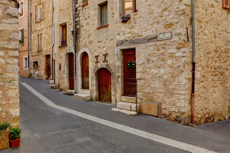 Nice, France - October 22, 2011, Narrow street in old tourist part of Nice - fifth most populous city and one of the most visited cities in France, receiving 4 million tourists every year.のeditorial素材