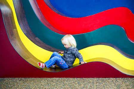 Pretty little girl playing in the Sculpt Illusion gallery, Puzzling World, Wanaka, New Zealand.の写真素材
