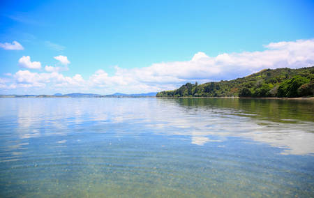 Beautiful water view with blue sky background. Whangarei beach, New Zealand.の写真素材