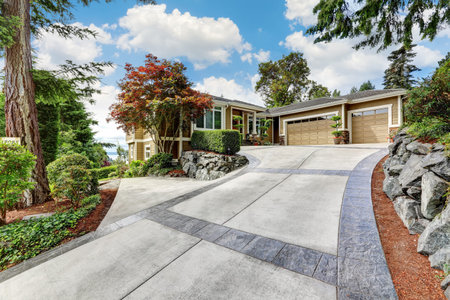 External view of luxurious detached house. Double garage with long and wide driveway. Northwest, USA