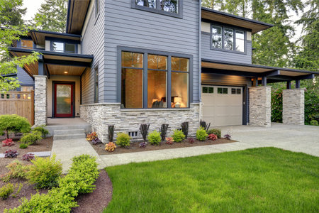 Luxurious new home with curb appeal. Trendy grey two-story exterior in Bellevue with large picture...