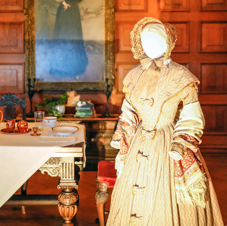 ASHEVILLE, NORTH CAROLINA - MARCH 4, 2017: Biltmore's costume exhibition. The room showcases the simpler style of Jane Eyre, beautifully sewn.のeditorial素材