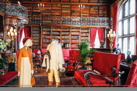 ASHEVILLE, NORTH CAROLINA - MARCH 4, 2017: Biltmore's costume exhibition, Spectacular library showcases the simple costumes from "Pride and Prejudice".のeditorial素材