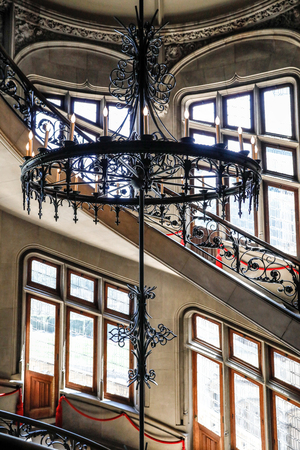 ASHEVILLE, NORTH CAROLINA - MARCH 4, 2017: The Biltmore House. Grand Staircase, the stone staircase spirals upward disappearing within its own height.のeditorial素材