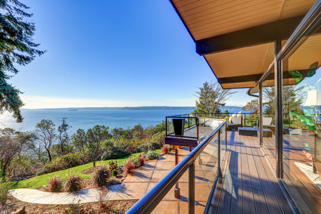 Modern two story panorama house with wraparound deck. Northwest, USAの写真素材