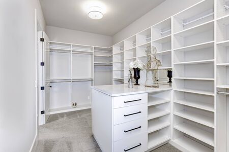 Luxury large new closet with lots of shelves.の写真素材