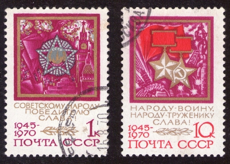 USSR - circa 1970  Two Soviet postage stamps   A stamps printed in USSR shows Victory award with the inscription  To the Soviet winner people glory   and medals with the inscription  To the people soldier, the people - to the worker glory   circa 1970のeditorial素材