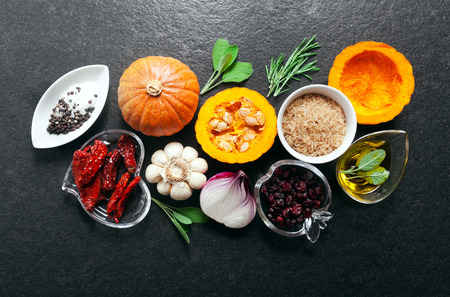 cooking Ingredients on a dark stone backgroundの写真素材