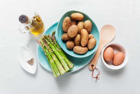 Food ingredients on the kitchen table. Healthy eating. Vegetarian gourmet cuisineの写真素材