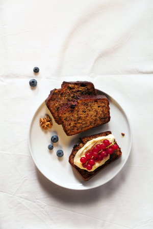  banana bread and berries . healthy snack 